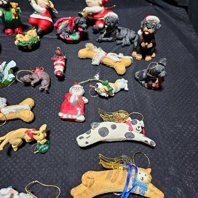 Christmas has gone to the dogs, and cats! All dog and cat ornaments perfect for pet lovers!