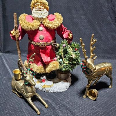 Santa clause with two brass deer