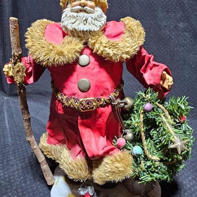 Santa clause with two brass deer