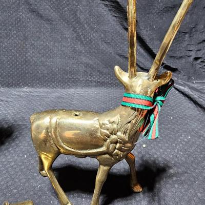 Santa clause with two brass deer