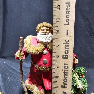 Santa clause with two brass deer