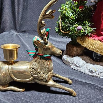Santa clause with two brass deer