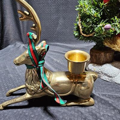 Santa clause with two brass deer
