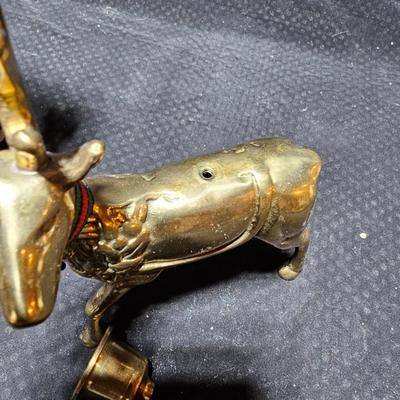 Santa clause with two brass deer