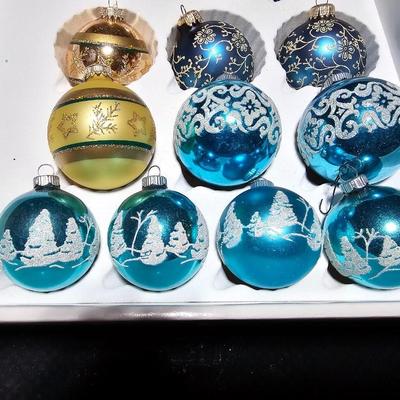 Vintage glitter decorated Christmas bulbs with four elegant stockings