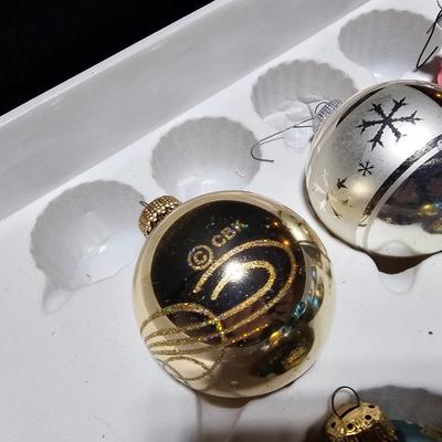 Vintage glitter decorated Christmas bulbs with four elegant stockings