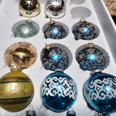 Vintage glitter decorated Christmas bulbs with four elegant stockings