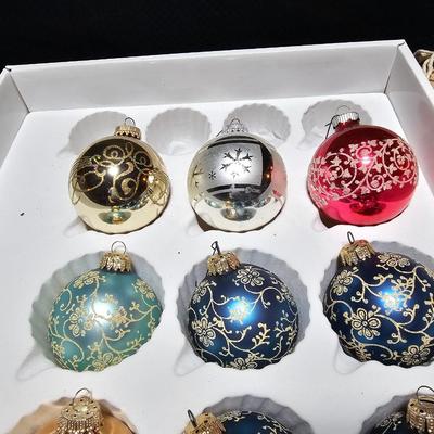 Vintage glitter decorated Christmas bulbs with four elegant stockings