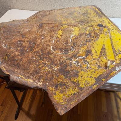 SLOW Beat up road sign, made out of Steel