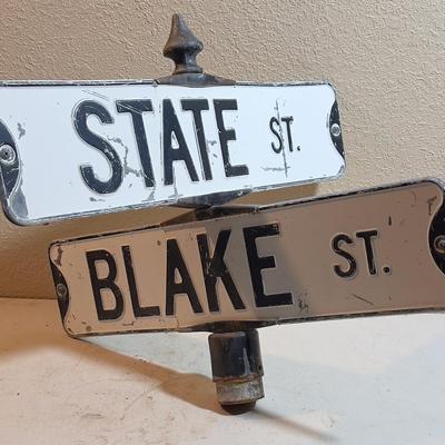 Meet me at State and Blake Street Intersection.