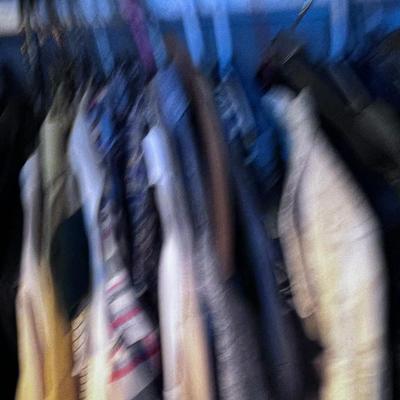 Closet full of men's clothing