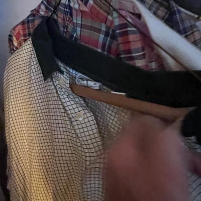 Closet full of men's clothing