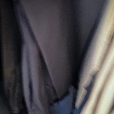 Closet full of men's clothing