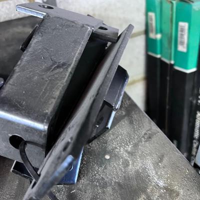 Pile of Suspension and Under Carriage Brackets