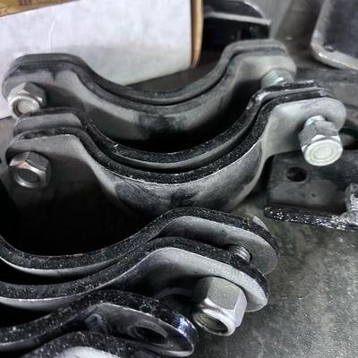 Pile of Suspension and Under Carriage Brackets