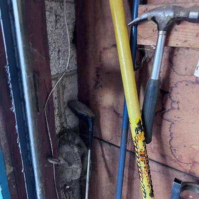 Yard tools north side of Cabinet