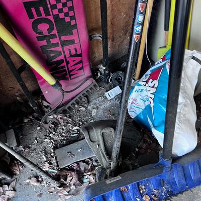 Yard tools north side of Cabinet