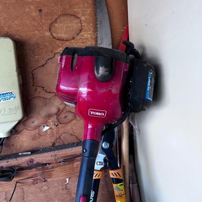 Yard tools north side of Cabinet