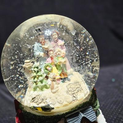 Large musical snow globe - stained glass wreath and a tall Santa