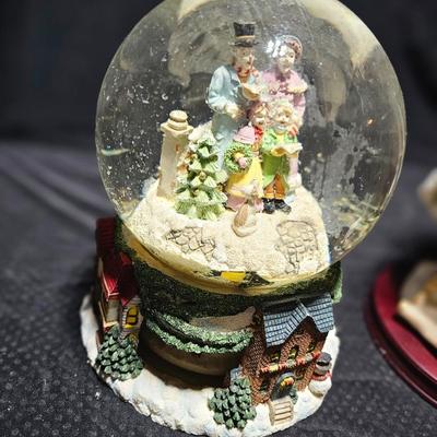 Large musical snow globe - stained glass wreath and a tall Santa
