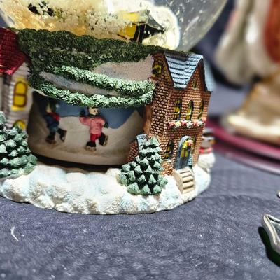 Large musical snow globe - stained glass wreath and a tall Santa