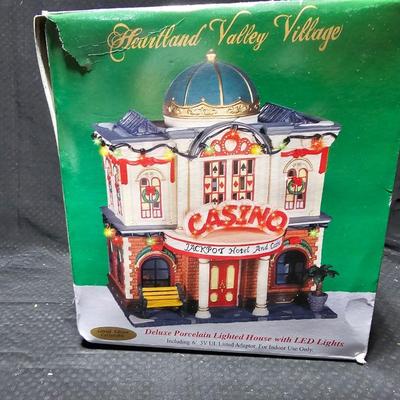 Two Christmas village buildings - Casino and crystal creek winery