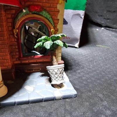 Two Christmas village buildings - Casino and crystal creek winery