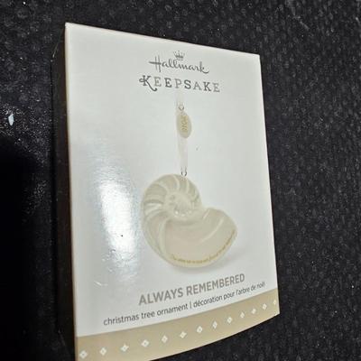 Three Hallmark keepsake Christmas Ornaments in original boxes