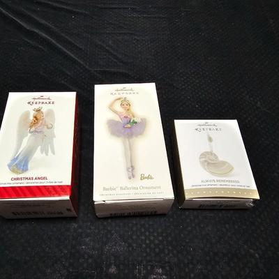 Three Hallmark keepsake Christmas Ornaments in original boxes