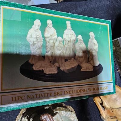 Collectible Porcelain Nativity set with wood Creche and accessories with wood based nativity people