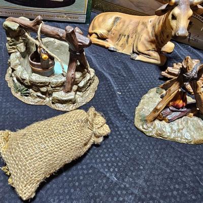 Collectible Porcelain Nativity set with wood Creche and accessories with wood based nativity people