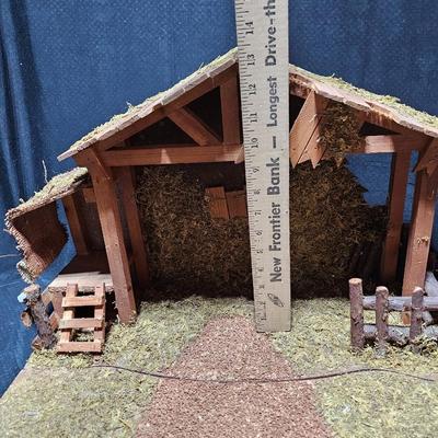 Collectible Porcelain Nativity set with wood Creche and accessories with wood based nativity people