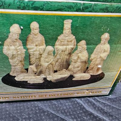 Collectible Porcelain Nativity set with wood Creche and accessories with wood based nativity people