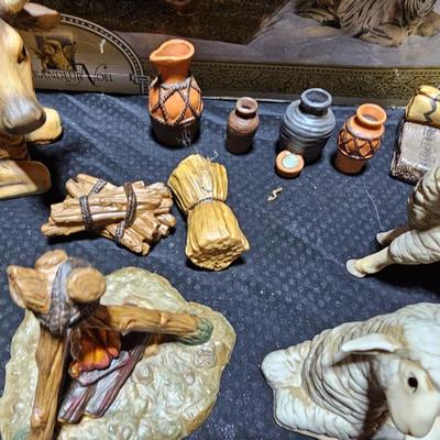 Collectible Porcelain Nativity set with wood Creche and accessories with wood based nativity people