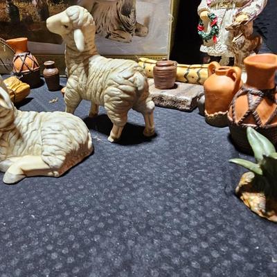 Collectible Porcelain Nativity set with wood Creche and accessories with wood based nativity people