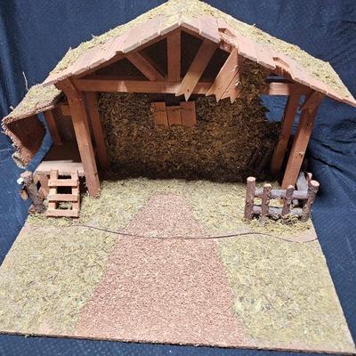 Collectible Porcelain Nativity set with wood Creche and accessories with wood based nativity people