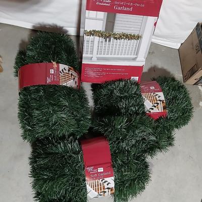 Christmas Garland - 2 6-foot Lit garland new in box and three 50-foot Garlands also new