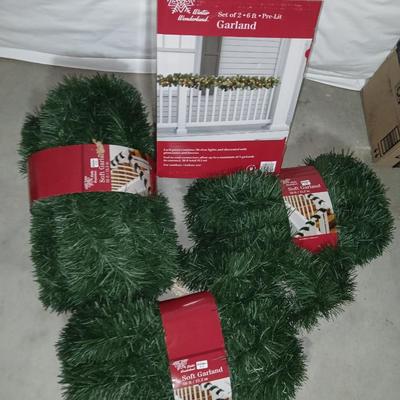 Christmas Garland - 2 6-foot Lit garland new in box and three 50-foot Garlands also new