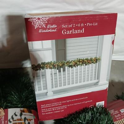 Christmas Garland - 2 6-foot Lit garland new in box and three 50-foot Garlands also new