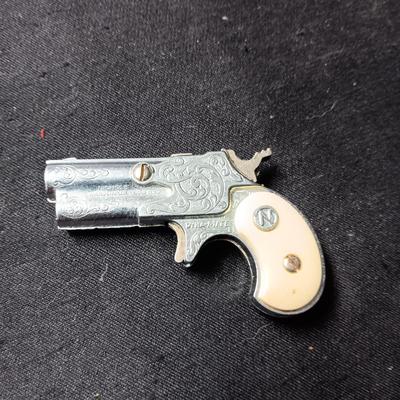 2 TOY CAP GUNS