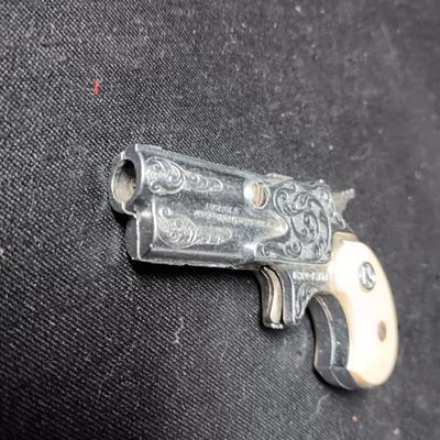 2 TOY CAP GUNS