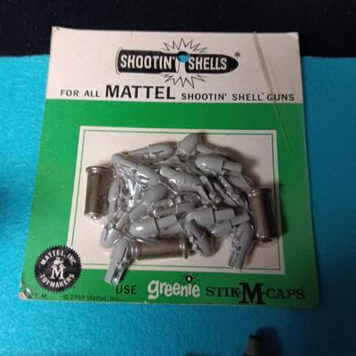 TOY SHOOTIN SHELLS AND CAPS
