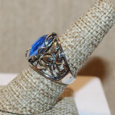 Size 8 Marked .925 Large Deep Blue Marquise Cut Ring with Leaves & Branch Side Accents on a Silver Band (5.7g)