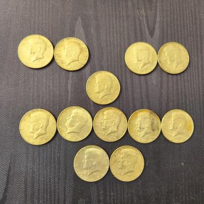 12 Kennedy Half Dollars coins 1965 to 1969
