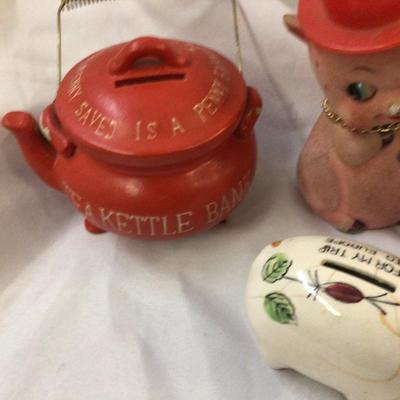 Sale Photo Thumbnail #349: You get this great lot of banks, two pig a bunny, a red kettle and another pottery pig banks.  All vintage and the two pottery ones have a little damage but not bad for their age.