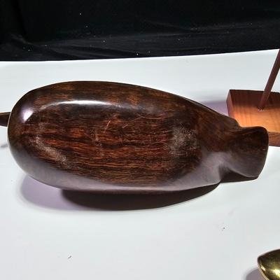 Two nice wooden ducks with brass geese and a duck on a post