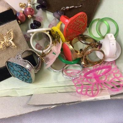 Sale Photo Thumbnail #422: You get a variety of jewelry, there are rings, earrings, pins, and more.