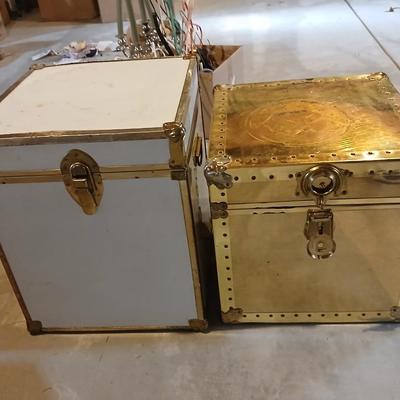 Two metal and wood storage trunks
