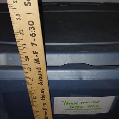 Two large sized storage totes with lids