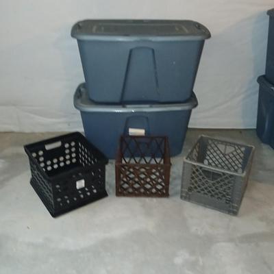 Two 32 gallon storage totes with lids and three milk like crates